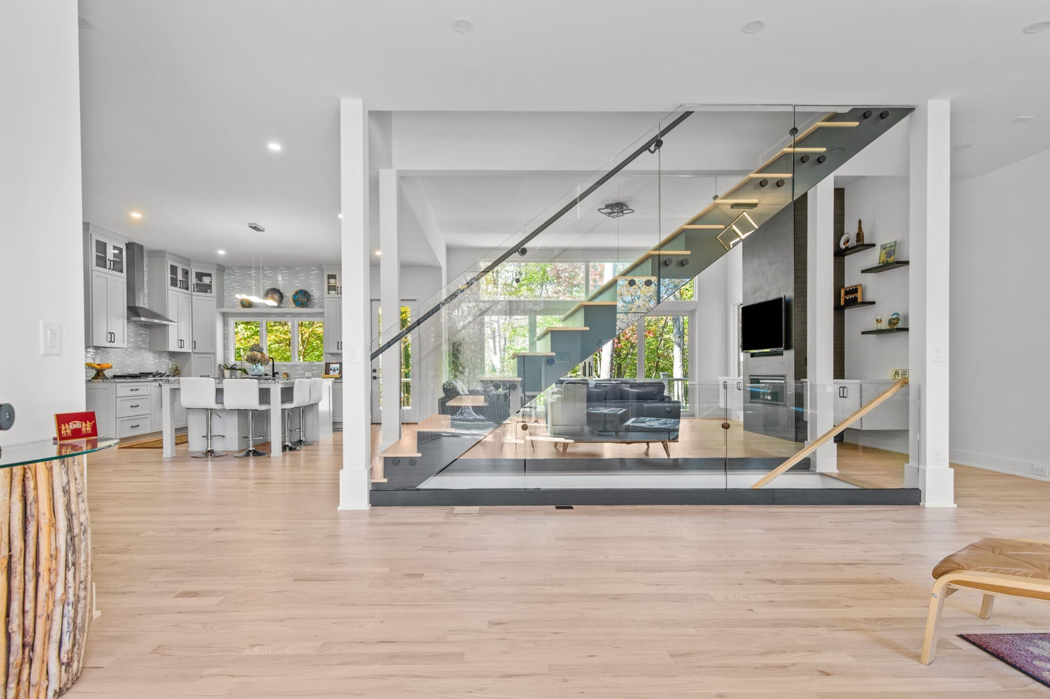 A large open living room with glass walls.