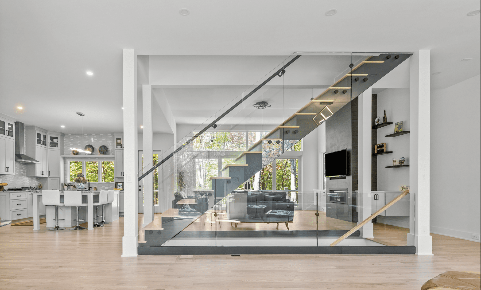 A living room with a couch and chair in it